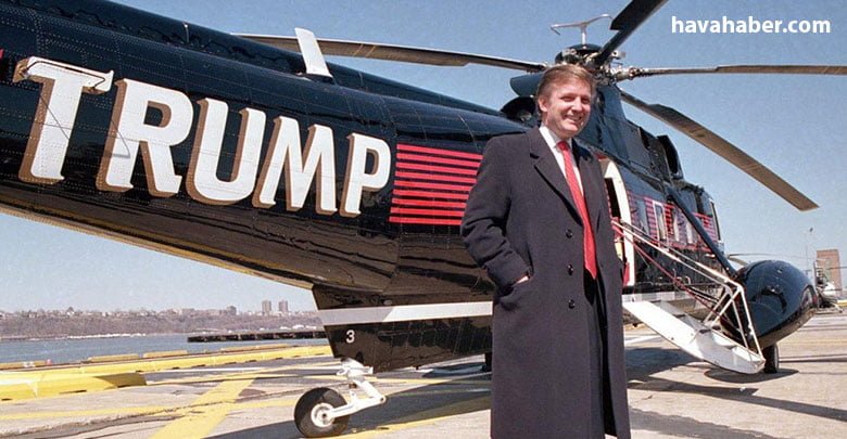 Donald Trump, 1988'de, sahip olduğu üç Sikorsky helikopterden birinin önünde poz verirken