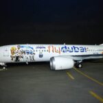 Abu-Dhabiden-Dohaya-Arjantine-ozel-giydirmeli-ucagi-ile-tasiyan-Flydubai-final-maci-sonrasinda-ise-sampiyona-ozel-B7337-MAX-ucagini-sergiledi.-