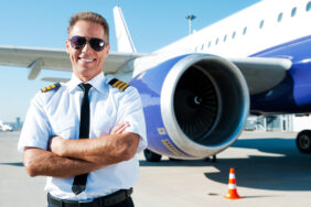 Confident,Pilot.,Confident,Male,Pilot,In,Uniform,Keeping,Arms,Crossed