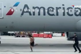Los-Angeles-Havalimanı’nda-Şaşkınlık-Yaratan-Olay--Üstünü-Çıkarıp-Apronda-Koştu-