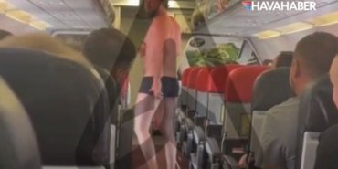 Uçakta dehşet anları Önce soyundu, sonra arka kapıyı açıp aprona atladı!