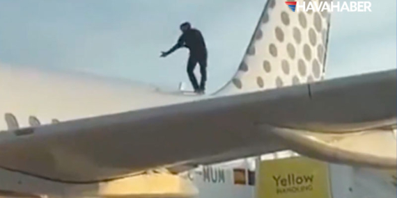 Valencia Havalimanı’nda akılalmaz olay: Uçağın tepesine çıkan yolcuyu polis indirdi!